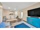 Living area showcases a breakfast bar and hardwood floors leading into other rooms at 4221 W Spruce St # 1123, Tampa, FL 33607