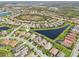 Aerial view of community, highlighting the home's location near a pond and green spaces at 4857 Tobermory Way, Bradenton, FL 34211