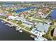 Waterfront neighborhood with homes featuring private docks, offering a picturesque and desirable coastal lifestyle at 5321 Bowline Bnd, New Port Richey, FL 34652