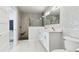 This bathroom features an updated vanity, toilet, and walk-in shower at 5321 Bowline Bnd, New Port Richey, FL 34652