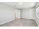 Spacious bedroom with tile flooring and recessed lighting at 5321 Bowline Bnd, New Port Richey, FL 34652