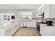 Contemporary kitchen with stainless steel appliances, stone countertops, and attractive backsplash at 5321 Bowline Bnd, New Port Richey, FL 34652