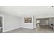 Open concept living room with tile flooring and recessed lighting at 5321 Bowline Bnd, New Port Richey, FL 34652