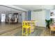 Game room with a checkerboard table, views to the dining room, and tile floors at 553 E Lake Dr, Largo, FL 33771