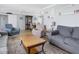 Open living space with a living room and dining area featuring comfortable seating and bright décor at 553 E Lake Dr, Largo, FL 33771