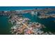 Gorgeous aerial view of the home nestled in a charming waterfront neighborhood at 5815 Bali S Way, St Pete Beach, FL 33706