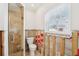 Bathroom with shower and window, ready for a fresh and modern update at 5815 Bali S Way, St Pete Beach, FL 33706