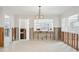 Open living room during renovation featuring exposed walls and a glimpse of adjacent rooms at 5815 Bali S Way, St Pete Beach, FL 33706