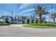 A beautiful clubhouse, showing its driveway, landscaping, and stately features at 6104 Talon Preserve Dr, Nokomis, FL 34275