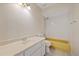 Bathroom featuring a vanity, toilet and shower over bath at 6908 Shady Pl, Tampa, FL 33634