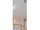Second story hallway with stained banister and carpet leading to bedrooms at 7010 Old Benton Dr, Apollo Beach, FL 33572