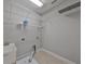 Practical laundry room area with utility sink and organized shelving for storage at 7010 Old Benton Dr, Apollo Beach, FL 33572