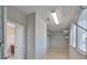 Bright walk-in closet with ample shelving space, multiple windows, and access to the Primary bath at 7010 Old Benton Dr, Apollo Beach, FL 33572