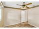 Bedroom featuring wood-look flooring, ceiling fan and neutral colors at 7281 61St N Ave, St Petersburg, FL 33709