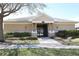 Exterior view of the community cabana with a gated entrance at 8010 Bally Money Rd, Tampa, FL 33610