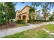 Charming two-story home featuring a welcoming entrance and well-maintained landscaping at 9033 Aspen Hollow Pl, Riverview, FL 33578