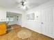Cozy dining area with neutral decor, a ceiling fan, and connection into the living room at 9737 36Th N Way, Pinellas Park, FL 33782