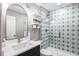 Bathroom with tile shower and chrome fixtures at 10129 Paddock Oaks Dr, Riverview, FL 33569