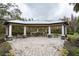Outdoor pavilion featuring seating and views of the natural surroundings at 10812 Applewood Range Way, Tampa, FL 33647