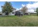 Expansive backyard featuring a cozy fire pit area, perfect for outdoor entertaining and relaxation at 11620 Bristol Chase Dr, Tampa, FL 33626