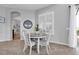 Cozy breakfast nook features a round table and seating for four, with natural light at 11620 Bristol Chase Dr, Tampa, FL 33626