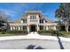 Community center featuring a pergola, manicured landscaping and inviting entrance at 11620 Bristol Chase Dr, Tampa, FL 33626