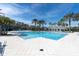 Large community pool with ample seating and shaded areas, perfect for relaxation and recreation at 11620 Bristol Chase Dr, Tampa, FL 33626