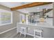 Modern kitchen boasts sleek countertops, stainless steel appliances, and an open design with counter seating at 14066 Marguerite Dr, Madeira Beach, FL 33708