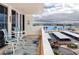 Relaxing balcony with patio furniture and views of the bay, offering a serene outdoor living space at 17920 Gulf Blvd # 702, Redington Shores, FL 33708