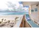Inviting balcony with seating offers stunning views of the beach and ocean, perfect for coastal living at 17920 Gulf Blvd # 702, Redington Shores, FL 33708