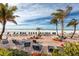 Beach access from landscaped recreation area including tables and chairs for residents at 17920 Gulf Blvd # 702, Redington Shores, FL 33708