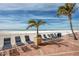 Easy beach access with sun loungers and trash/recycle receptacles for community residents at 17920 Gulf Blvd # 702, Redington Shores, FL 33708