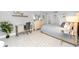 Bright bedroom with a large bed, dresser, desk and serene ambiance at 17920 Gulf Blvd # 702, Redington Shores, FL 33708