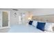 Bright bedroom featuring a comfortable bed, walk-in closet and serene ambiance at 17920 Gulf Blvd # 702, Redington Shores, FL 33708