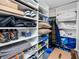 Organized walk-in closet with built-in shelving, providing ample storage space at 17920 Gulf Blvd # 702, Redington Shores, FL 33708