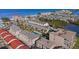 Aerial view of a residential complex near a beach, showcasing proximity to water and amenities at 19727 Gulf Blvd # 209, Indian Shores, FL 33785