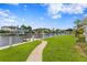 Waterfront home with private dock and lush green lawn at 2090 Iowa Ne Ave, St Petersburg, FL 33703