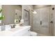 Bathroom featuring a glass shower, a modern vanity, and elegant finishes at 29912 Rusco Ct, Wesley Chapel, FL 33545
