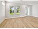 Living room with hardwood floors and lots of natural light at 3021 W Ballast Pt # 2, Tampa, FL 33611