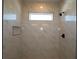 Modern shower with beautiful tile work and a window at 3021 W Ballast Pt # 2, Tampa, FL 33611