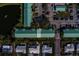 Aerial view showcasing the unit highlighted in a community near a pond and parking at 6033 113Th St # 213, Seminole, FL 33772