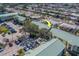Aerial view of a quaint community near the water featuring ample parking and mature trees at 6033 113Th St # 213, Seminole, FL 33772