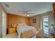 Cozy bedroom with neutral tones, comfortable bed, and ample natural light at 6033 113Th St # 213, Seminole, FL 33772