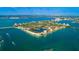 Gorgeous aerial view of a waterfront community featuring lush landscaping, waterways, and stunning architecture at 6083 Bahia Del Mar Cir # 359, St Petersburg, FL 33715