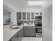 Charming kitchen featuring stainless steel appliances and ample counter space at 6083 Bahia Del Mar Cir # 359, St Petersburg, FL 33715