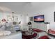 Inviting living room with neutral decor, water views, and open access to the dining area at 6083 Bahia Del Mar Cir # 359, St Petersburg, FL 33715