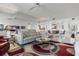 Living room with large sofa, tv and access to the kitchen and dining area at 6083 Bahia Del Mar Cir # 359, St Petersburg, FL 33715