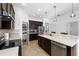 Spacious kitchen boasts ample cabinet space, stainless appliances, and an open layout, perfect for culinary enthusiasts at 6157 Castleton Hollow Rd, Riverview, FL 33578