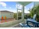 Inviting screened-in patio with comfortable seating and views of the lush backyard at 6157 Castleton Hollow Rd, Riverview, FL 33578