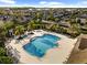 A sprawling community pool with lots of seating, and lush landscaping, perfect for relaxation and recreation at 6157 Castleton Hollow Rd, Riverview, FL 33578